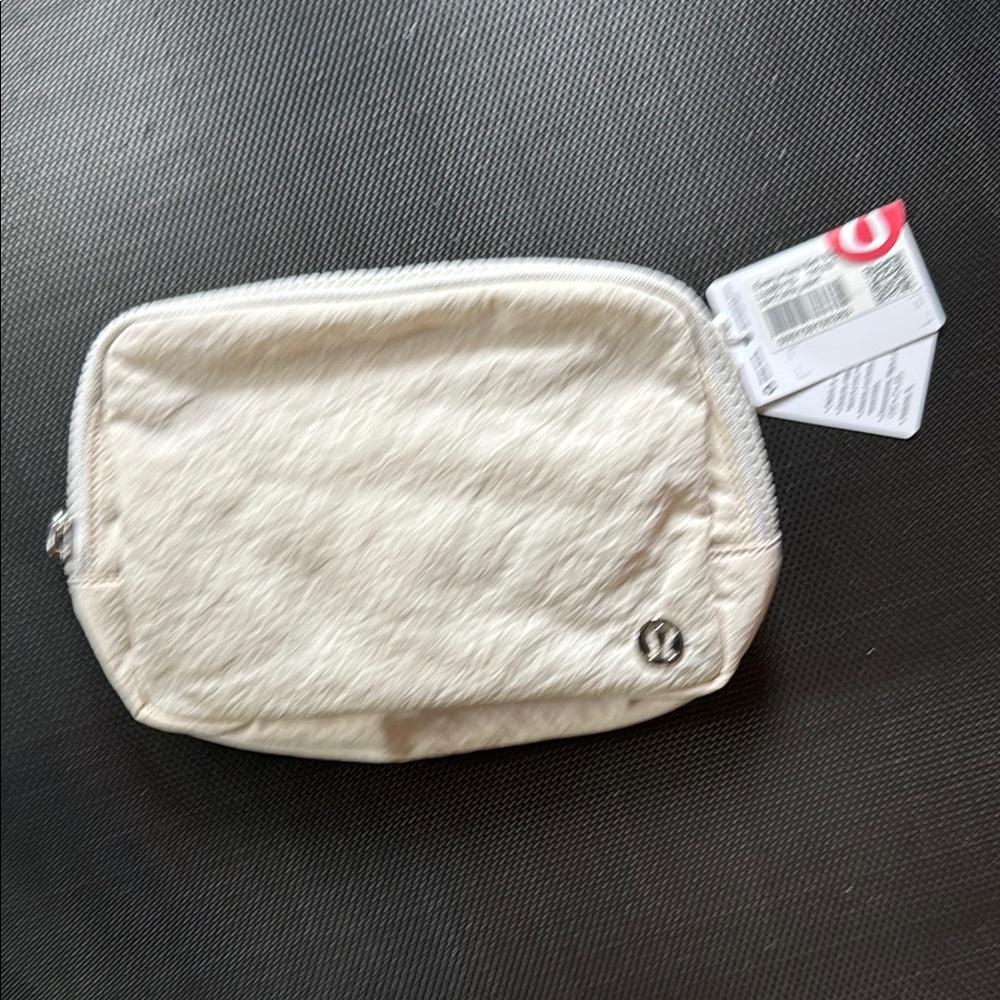 Lululemon “Everywhere” Wordmark Belt Bag in Ivory/Off-White